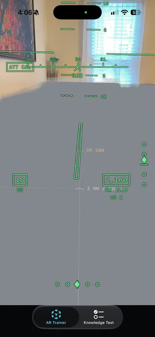 Green head-up display over the room showing heading tape, groundspeed 18, altitude 2,160 and localizer and glideslope diamonds